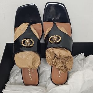Kurt Geiger Black Patent Slide Mules with Gold Crest Emblem